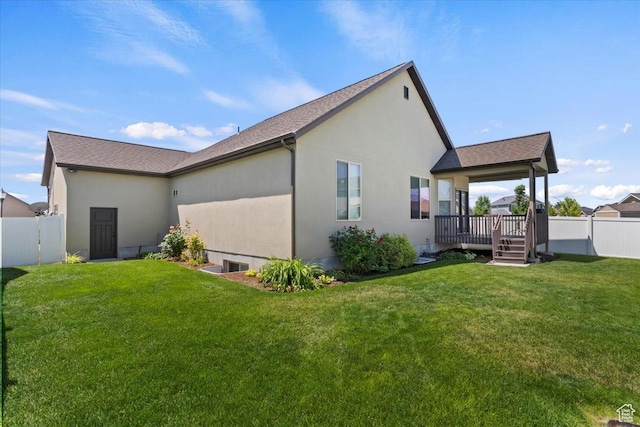 2432 Field Stone Way, Layton, UT 84041 - rear view of property with roof with shingles, stucco siding, and a deck