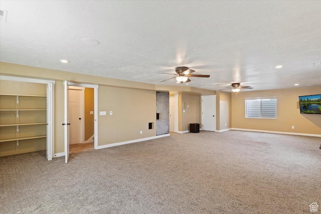 2432 Field Stone Way, Layton, UT 84041 - unfurnished living room featuring carpet, ceiling fan, a textured ceiling, baseboards, and recessed lighting