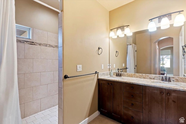 2432 Field Stone Way, Layton, UT 84041 - bathroom with double vanity, a tile shower, and baseboards