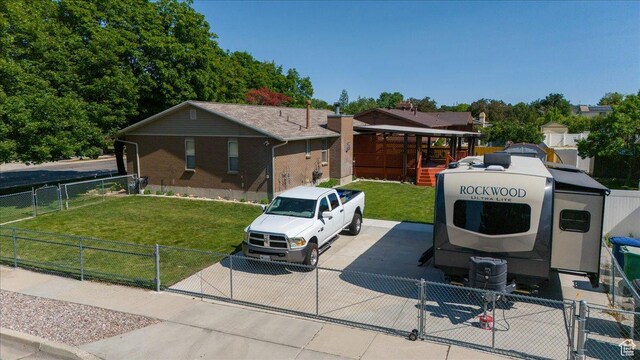6837 S Baldwin Ave, West Jordan, UT 84084 - view of front facade with a gate
