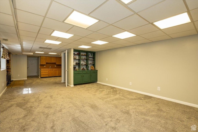 6837 S Baldwin Ave, West Jordan, UT 84084 - empty room featuring light carpet, baseboards, and a paneled ceiling