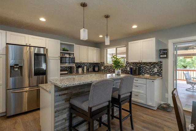 6837 S Baldwin Ave, West Jordan, UT 84084 - kitchen featuring stainless steel appliances, white cabinetry, backsplash, open shelves, and dark wood-style floors