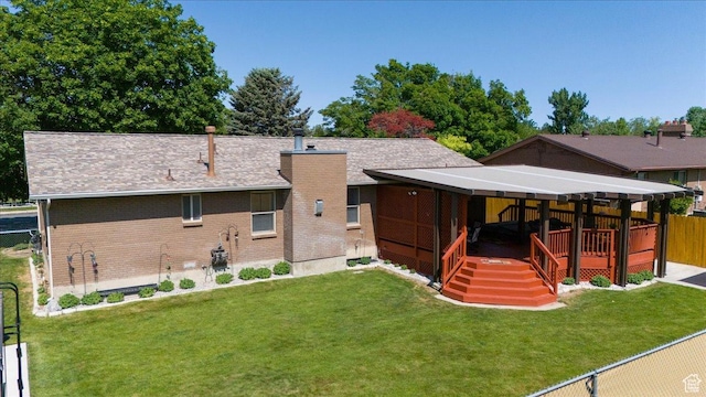 6837 S Baldwin Ave, West Jordan, UT 84084 - back of house featuring a chimney, a wooden deck, brick siding, and a shingled roof