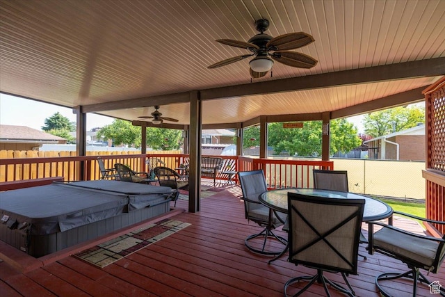 6837 S Baldwin Ave, West Jordan, UT 84084 - deck with a covered hot tub, ceiling fan, and outdoor dining area