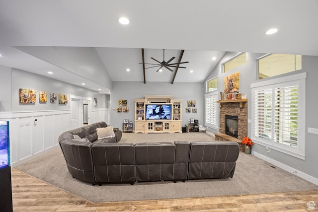 2609 W 3075 S, West Haven, UT 84401 - living room with recessed lighting, a stone fireplace, a ceiling fan, wood finished floors, and baseboards