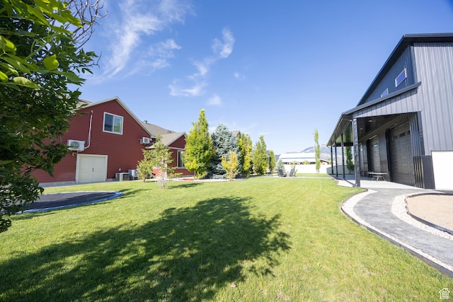 2609 W 3075 S, West Haven, UT 84401 - view of green lawn featuring a garage