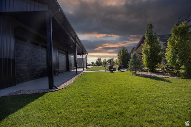 2609 W 3075 S, West Haven, UT 84401 - yard at dusk with a lawn and a garage
