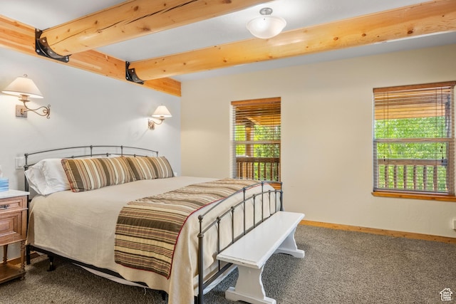 125 W Persimmon Dr Unit 2, Garden City, UT 84028 - carpeted bedroom with beamed ceiling and baseboards