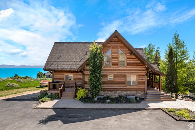 125 W Persimmon Dr Unit 2, Garden City, UT 84028 - cabin with a deck with water view and roof with shingles