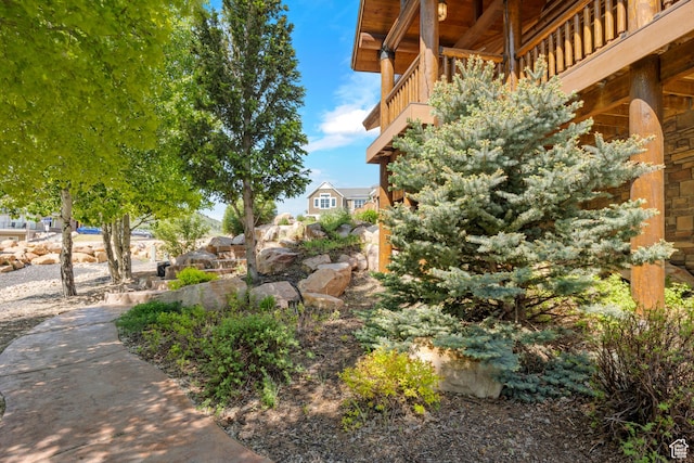125 W Persimmon Dr Unit 2, Garden City, UT 84028 - view of yard featuring a balcony