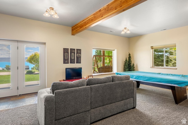 125 W Persimmon Dr Unit 2, Garden City, UT 84028 - living area featuring beam ceiling and stone tile floors