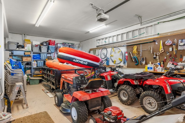 125 W Persimmon Dr Unit 2, Garden City, UT 84028 - garage with a garage door opener and a workshop area