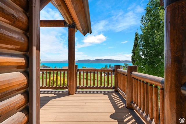 125 W Persimmon Dr Unit 2, Garden City, UT 84028 - deck with a water and mountain view