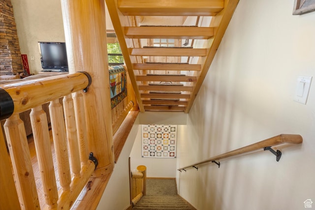 125 W Persimmon Dr Unit 2, Garden City, UT 84028 - stairway with carpet flooring