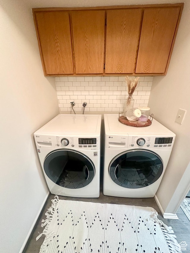 1175 S Canyon Rd E Unit 81, Ogden, UT 84404 - washroom featuring cabinet space, washer and clothes dryer, and baseboards