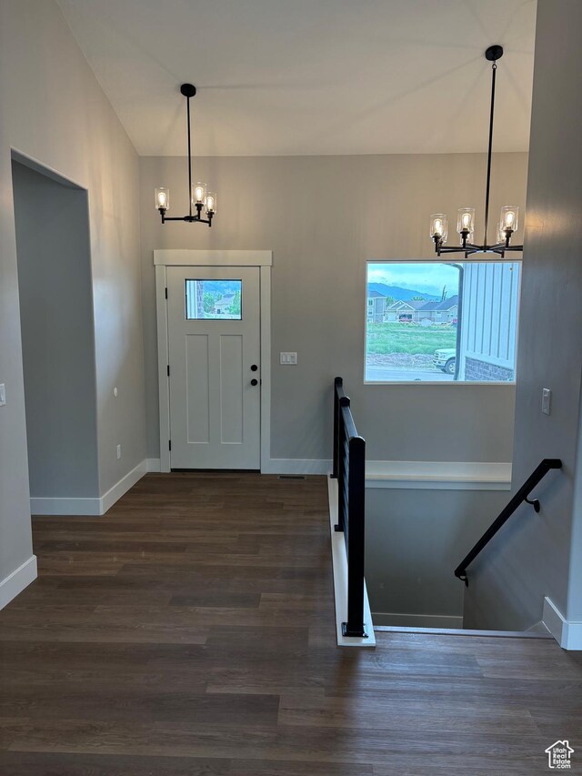 3323 N 1200 W, Pleasant View, UT 84414 - entrance foyer featuring a chandelier and wood finished floors