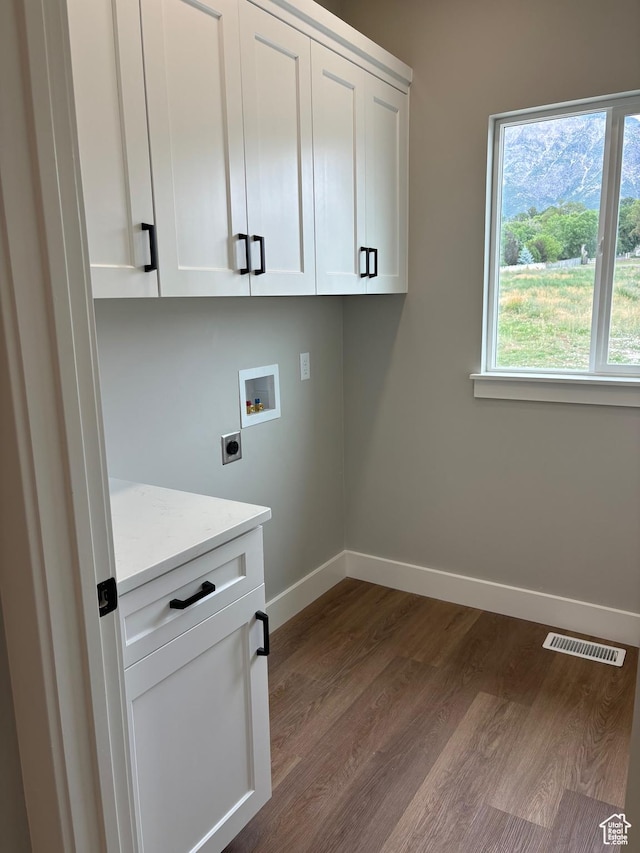 3323 N 1200 W, Pleasant View, UT 84414 - laundry room with washer hookup, dark wood-style floors, hookup for an electric dryer, and cabinet space