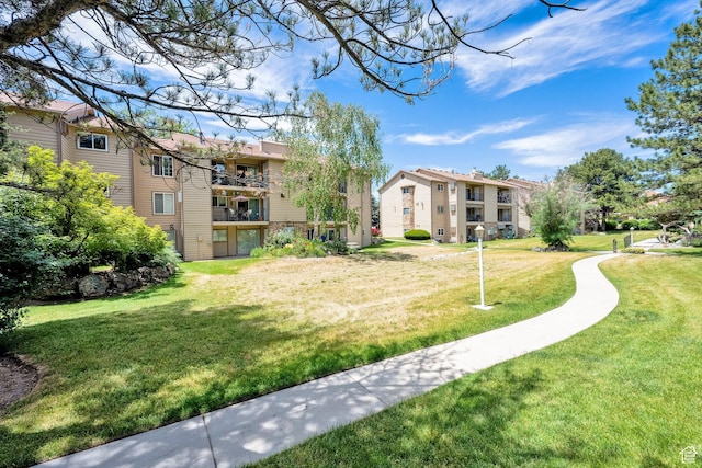 7733 S Briarsprings Dr, Midvale, UT 84047 - view of home's community with a lawn