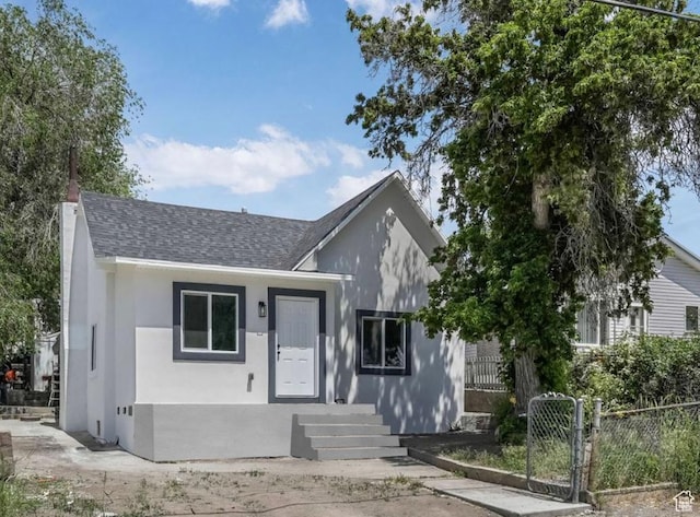 72 W Leadville Row, Eureka, UT 84628 - view of front facade with roof with shingles and stucco siding
