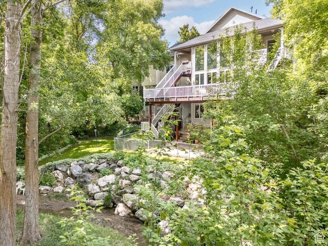 4862 S Kiwana Dr, South Ogden, UT 84403 - view of yard featuring stairway and a deck