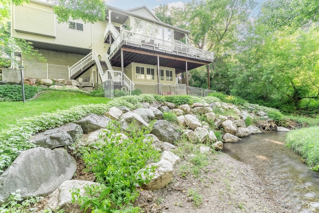 4862 S Kiwana Dr, South Ogden, UT 84403 - rear view of house with stairway and a wooden deck