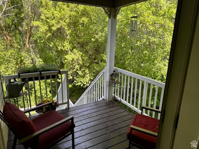 4862 S Kiwana Dr, South Ogden, UT 84403 - wooden terrace featuring a forest view