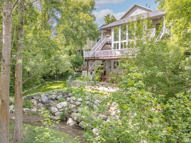 4862 S Kiwana Dr, South Ogden, UT 84403 - view of yard with stairs and a wooden deck
