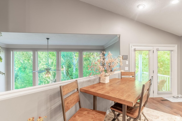 4862 S Kiwana Dr, South Ogden, UT 84403 - dining room featuring healthy amount of natural light, lofted ceiling, light wood-style flooring, crown molding, and recessed lighting