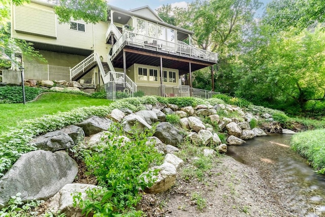 4862 S Kiwana Dr, South Ogden, UT 84403 - rear view of house with a wooden deck and stairway