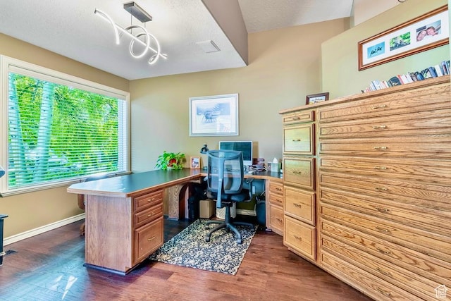 4862 S Kiwana Dr, South Ogden, UT 84403 - office featuring dark wood-style flooring and a textured ceiling