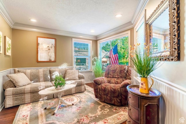 4862 S Kiwana Dr, South Ogden, UT 84403 - living area featuring wood finished floors, a textured ceiling, ornamental molding, wainscoting, and recessed lighting