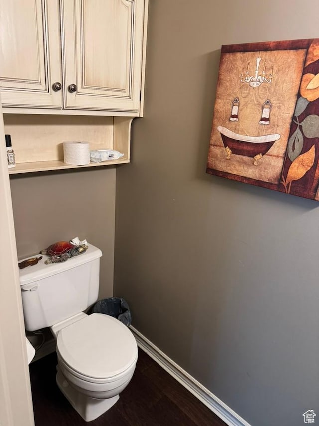 4862 S Kiwana Dr, South Ogden, UT 84403 - bathroom with baseboards and wood finished floors