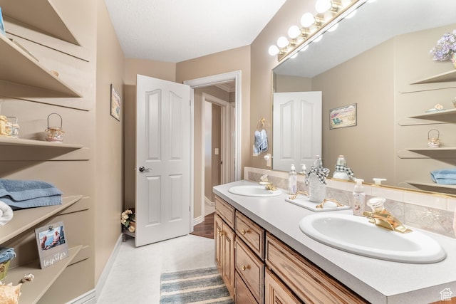 4862 S Kiwana Dr, South Ogden, UT 84403 - full bath featuring double vanity and baseboards