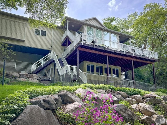 4862 S Kiwana Dr, South Ogden, UT 84403 - rear view of property featuring stairway and a wooden deck