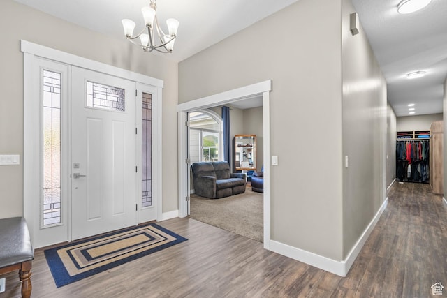 588 S 100 E, Mantua, UT 84324 - entryway featuring a chandelier, baseboards, and wood finished floors