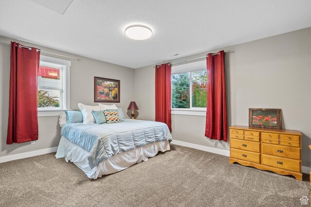 588 S 100 E, Mantua, UT 84324 - carpeted bedroom featuring baseboards