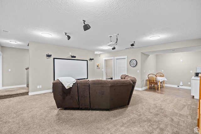 588 S 100 E, Mantua, UT 84324 - carpeted cinema featuring a textured ceiling and baseboards
