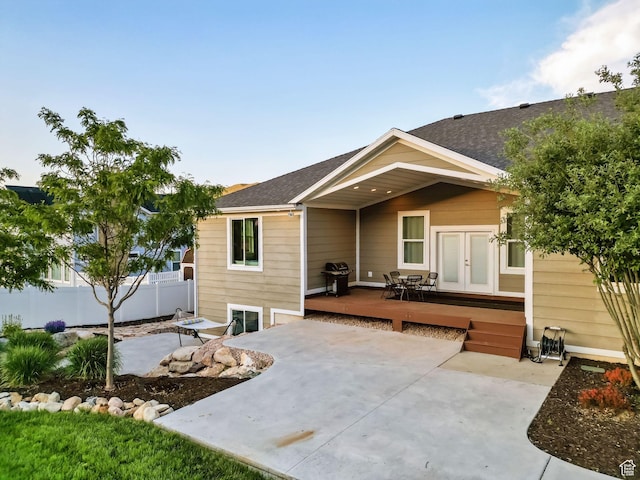 588 S 100 E, Mantua, UT 84324 - back of property featuring french doors, a deck, a patio, and a shingled roof