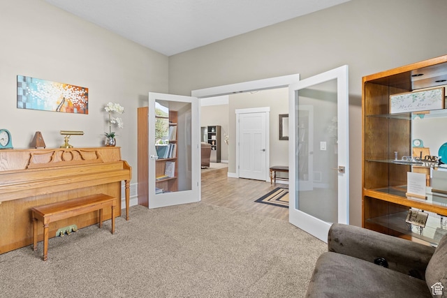 588 S 100 E, Mantua, UT 84324 - living area featuring carpet, french doors, and baseboards