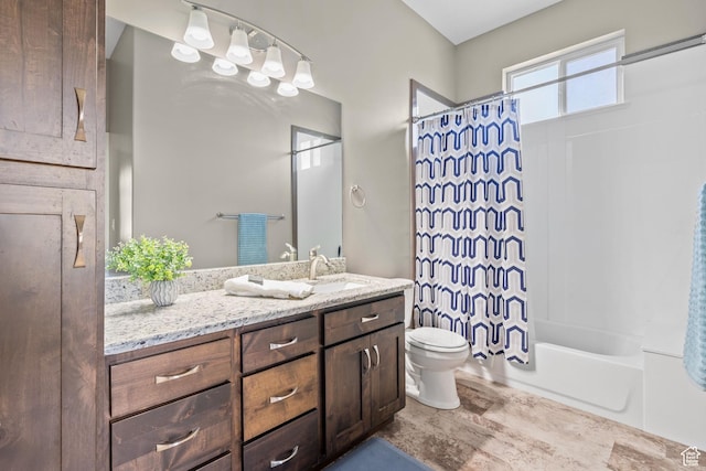 588 S 100 E, Mantua, UT 84324 - full bathroom featuring vanity, toilet, and shower / tub combo