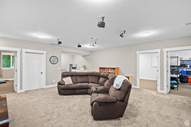 588 S 100 E, Mantua, UT 84324 - living area with carpet flooring, a textured ceiling, and baseboards