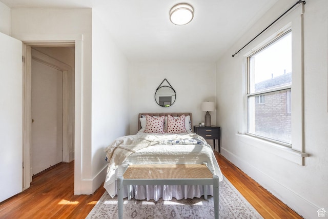1240 W Indiana Ave, Salt Lake City, UT 84104 - bedroom featuring wood finished floors and baseboards