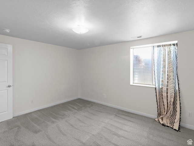 164 S 400 E, Fairview, UT 84629 - spare room featuring carpet flooring, baseboards, a textured ceiling, and a smoke detector