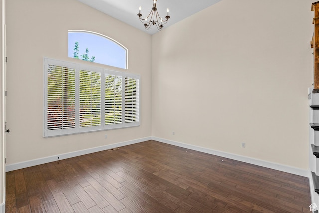 923 W 965 N, Orem, UT 84057 - unfurnished room with a chandelier, dark wood-type flooring, high vaulted ceiling, and baseboards