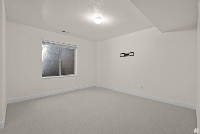 923 W 965 N, Orem, UT 84057 - spare room with light carpet, a textured ceiling, and baseboards