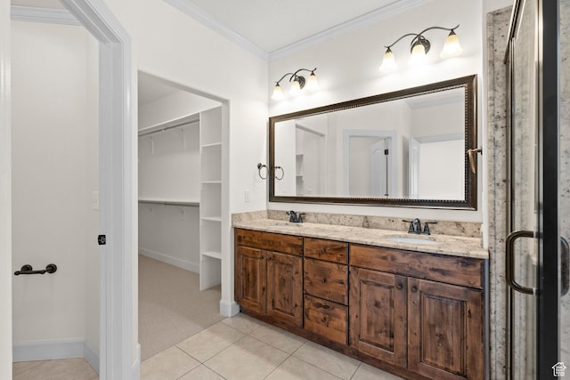 923 W 965 N, Orem, UT 84057 - bathroom with ornamental molding, double vanity, tile patterned floors, and a walk in closet