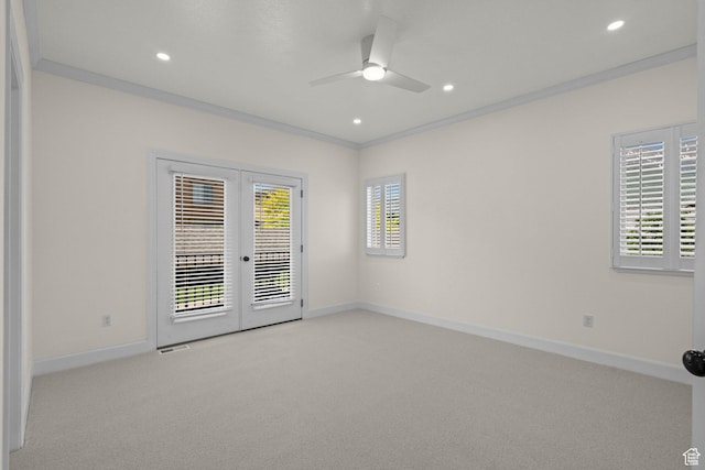 923 W 965 N, Orem, UT 84057 - empty room with french doors, crown molding, light carpet, ceiling fan, and baseboards