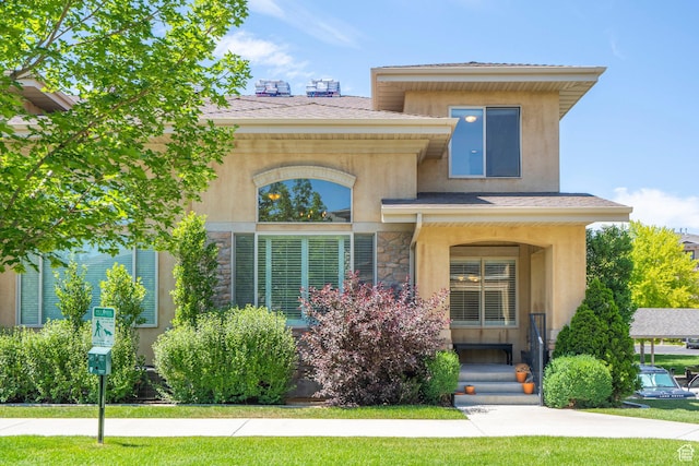 923 W 965 N, Orem, UT 84057 - view of front of home featuring stucco siding, stone siding, and a front yard