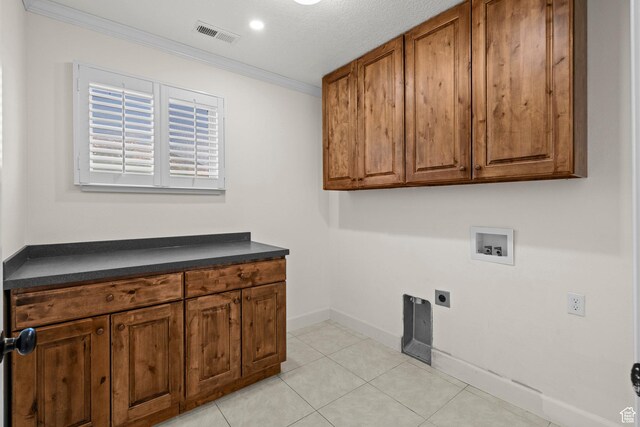 923 W 965 N, Orem, UT 84057 - laundry area featuring hookup for a washing machine, cabinet space, hookup for an electric dryer, ornamental molding, and baseboards