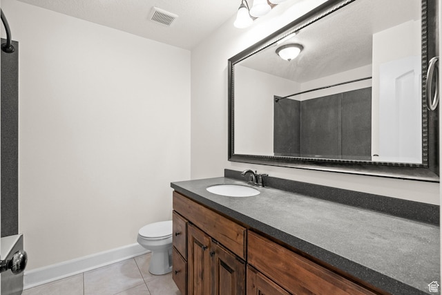 923 W 965 N, Orem, UT 84057 - full bathroom with tile patterned flooring, vanity, toilet, baseboards, and a shower